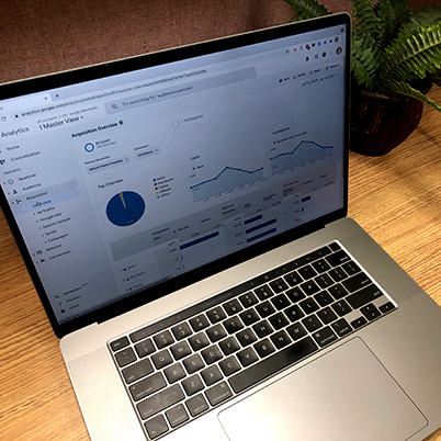 Laptop with analytics metrics overview