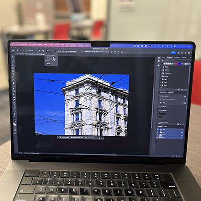 Image of laptop with Photoshop and remove wires and cables open